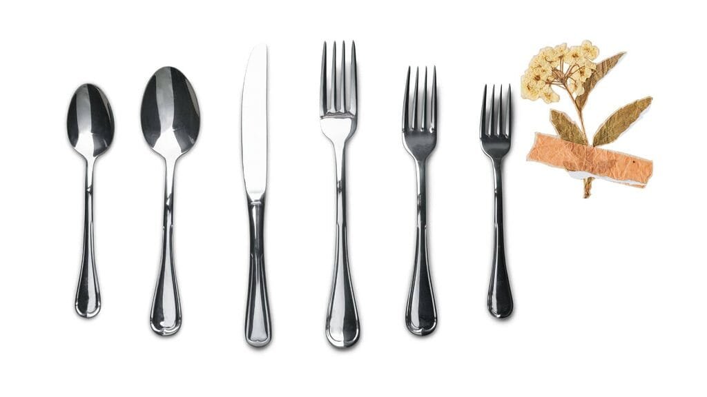 Set of spoons, knives, and forks
