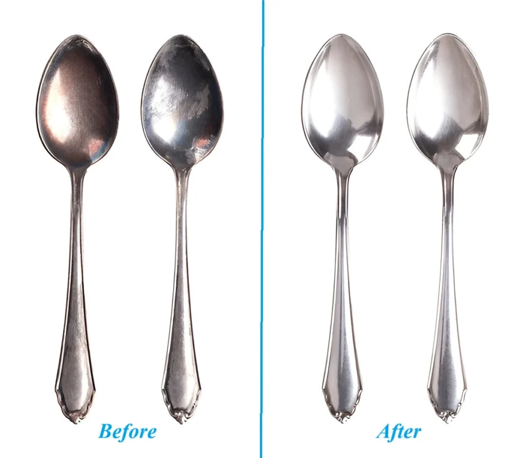 A pair of tarnished spoons before and after cleaning in an effort on how to make silver shiny again