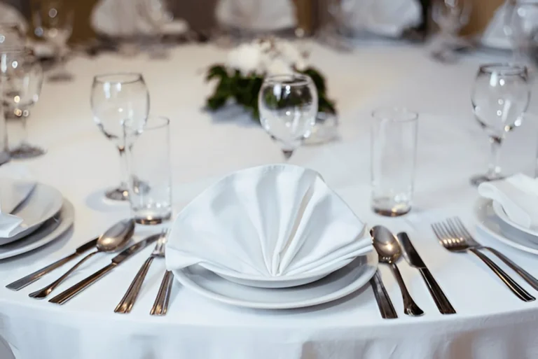 A demonstration of how to set flatware on the table