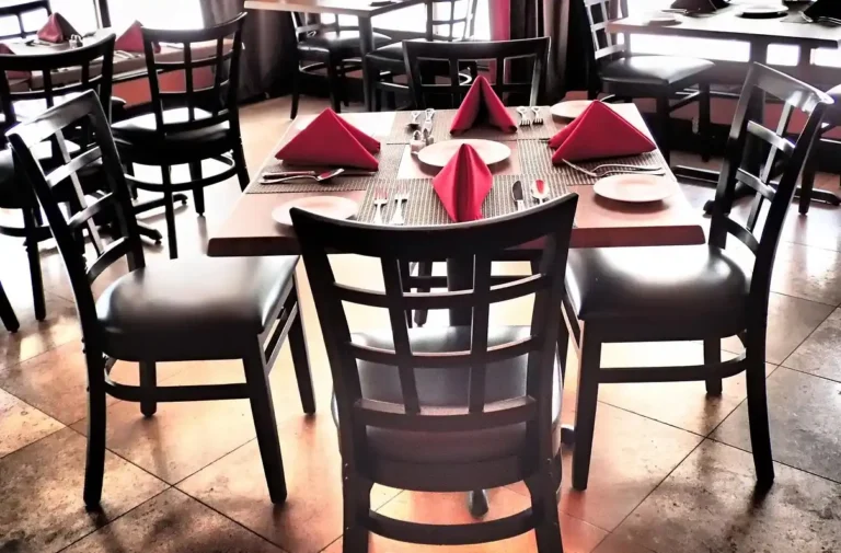 A table setting for four persons with Cambridge Silversmiths flatware
