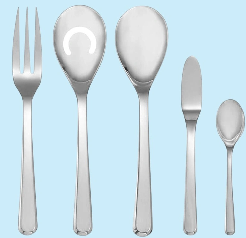 Nambe Aura five piece service: solid serving spoon, slotted serving spoon, service form, butter knife and sugar spoon on light blue background