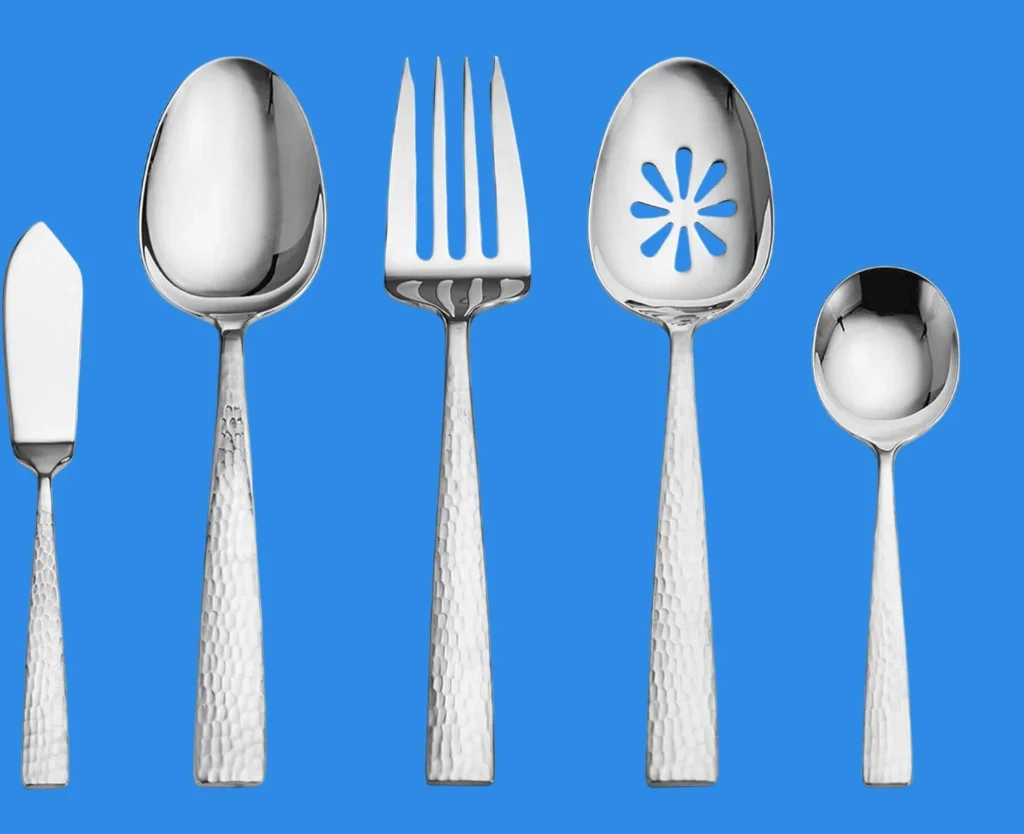 Five piece serving set of Mikasa Oliver hammered flatware