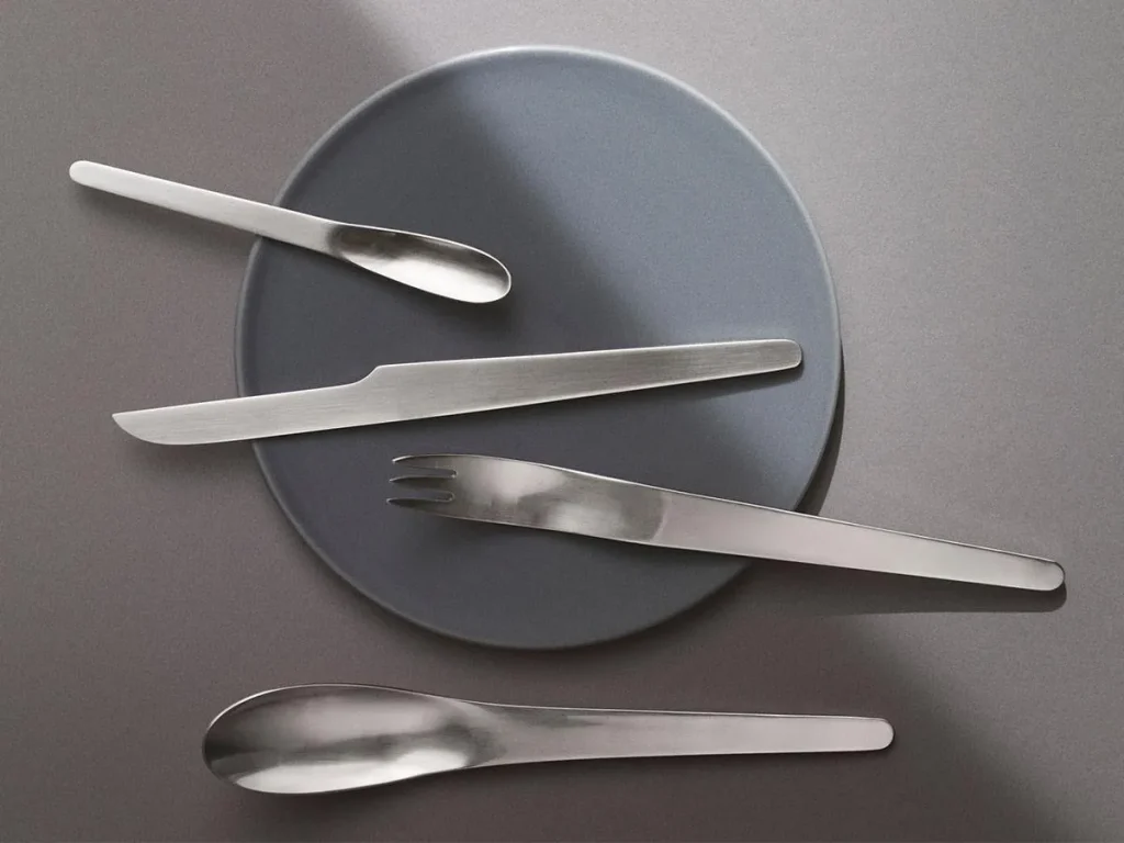 A 4 piece set of A J Georg Jensen cutlery set explaining durability and maintenance